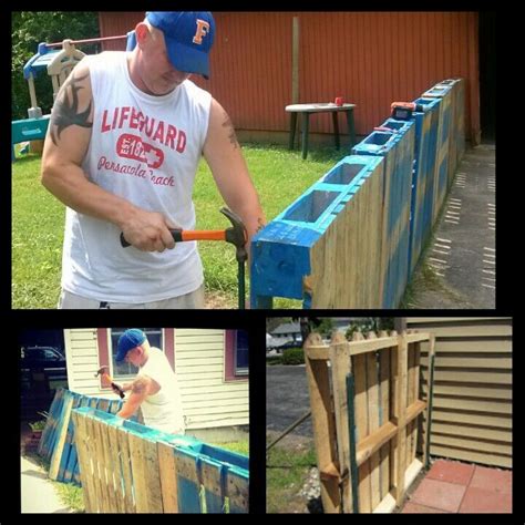 pallet and metal fence stake enclosure|design a pallet fence.